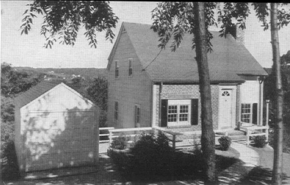 the brick-front Perry house